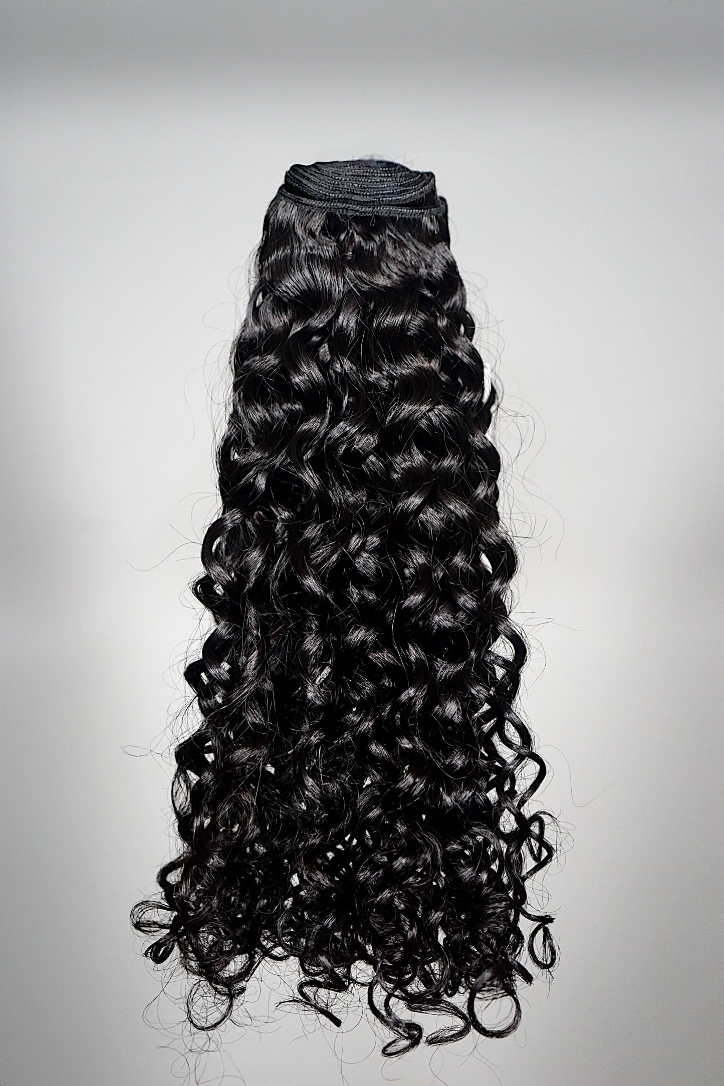 La Captivante – Mèche de tissage texture bouclée